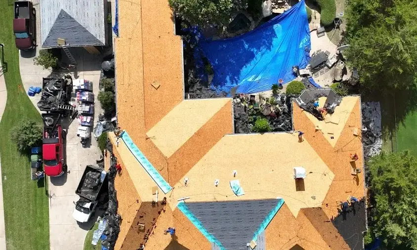 Professional Storm Damage Roof Repair being performed in West Miami